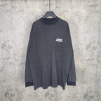 Balenciaga long-sleeve top, dark charcoal gray, small chest logo patch