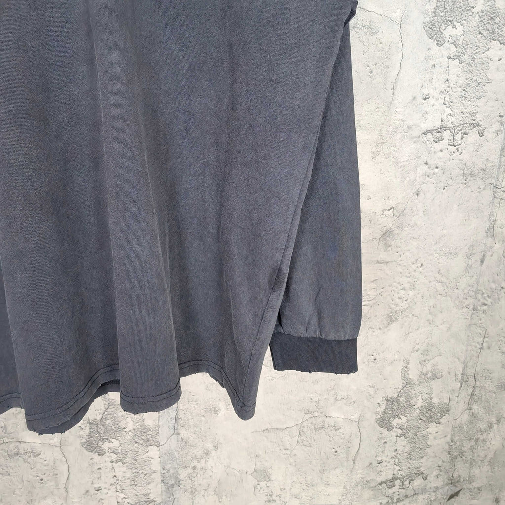 Balenciaga long-sleeve top, side split hem and ribbed sleeve cuffs