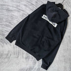 Black zip-up hoodie jacket with hood, back logo patch, and sleeves