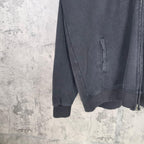 Black hoodie jacket hem and sleeve cuffs with front zipper seam detail
