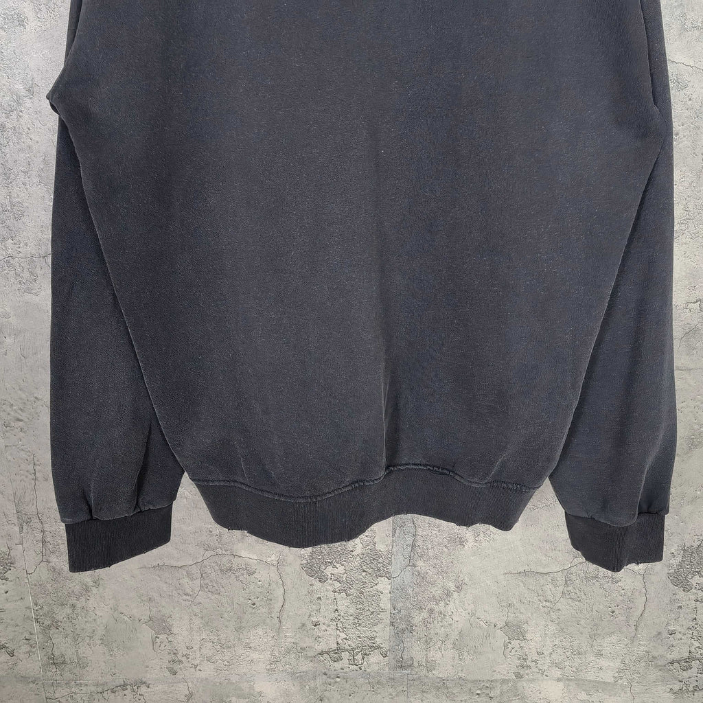 Zip-up hoodie back view with relaxed fit and ribbed hem, dark blue