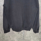 Zip-up hoodie back view with relaxed fit and ribbed hem, dark blue