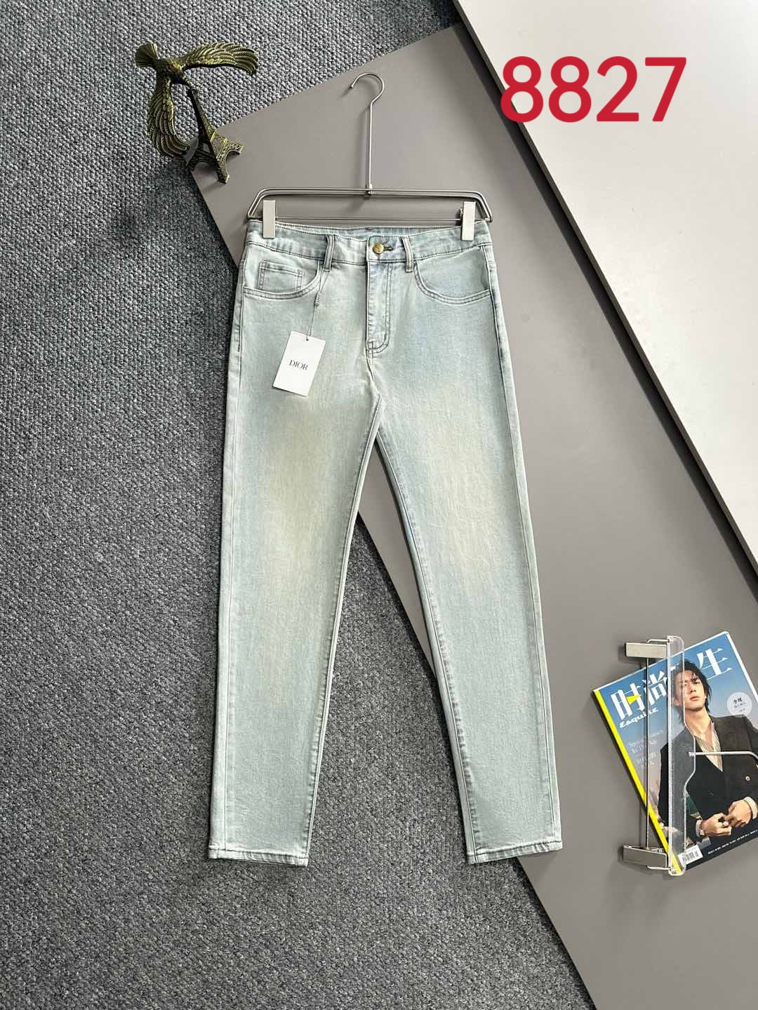 Light blue denim jeans with front pockets and belt loops