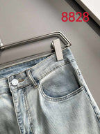 Light-wash denim jeans back pocket with belt loop and patch area