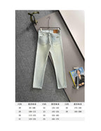 Light-wash denim jeans with size chart text below, front view on display