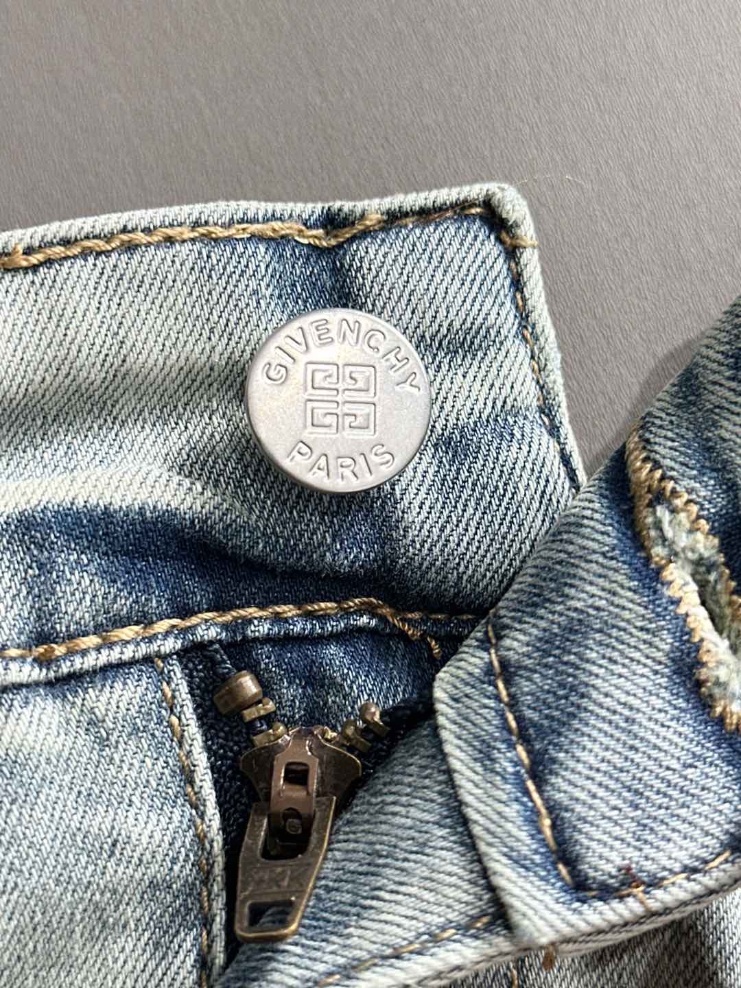 Givenchy jeans waist label and zipper detail
