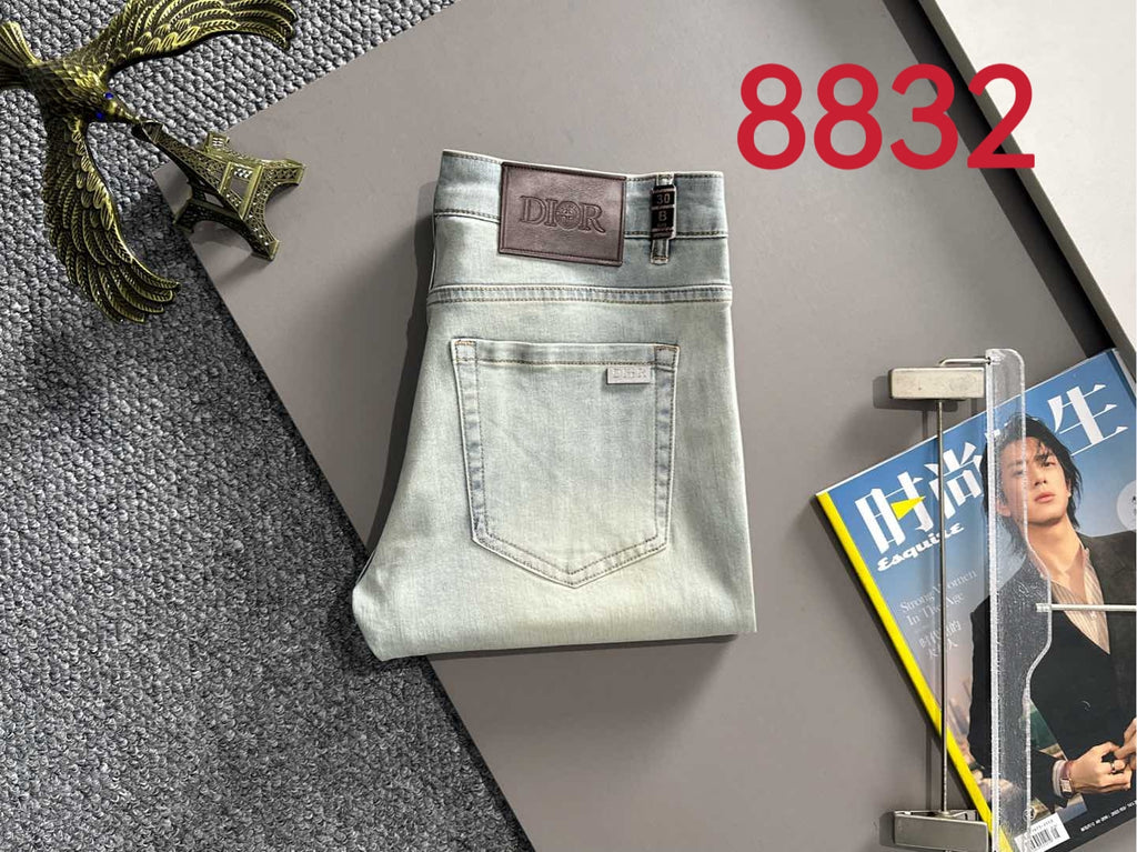 Light-wash Dior denim pants, back pockets and waistband brand patch