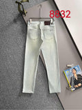 Light-wash Dior denim pants on hanger, straight legs with back pockets