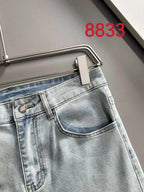 Light blue denim pants back view with coin pocket and belt loops