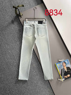 Prada light-wash denim pants with front pockets and straight legs