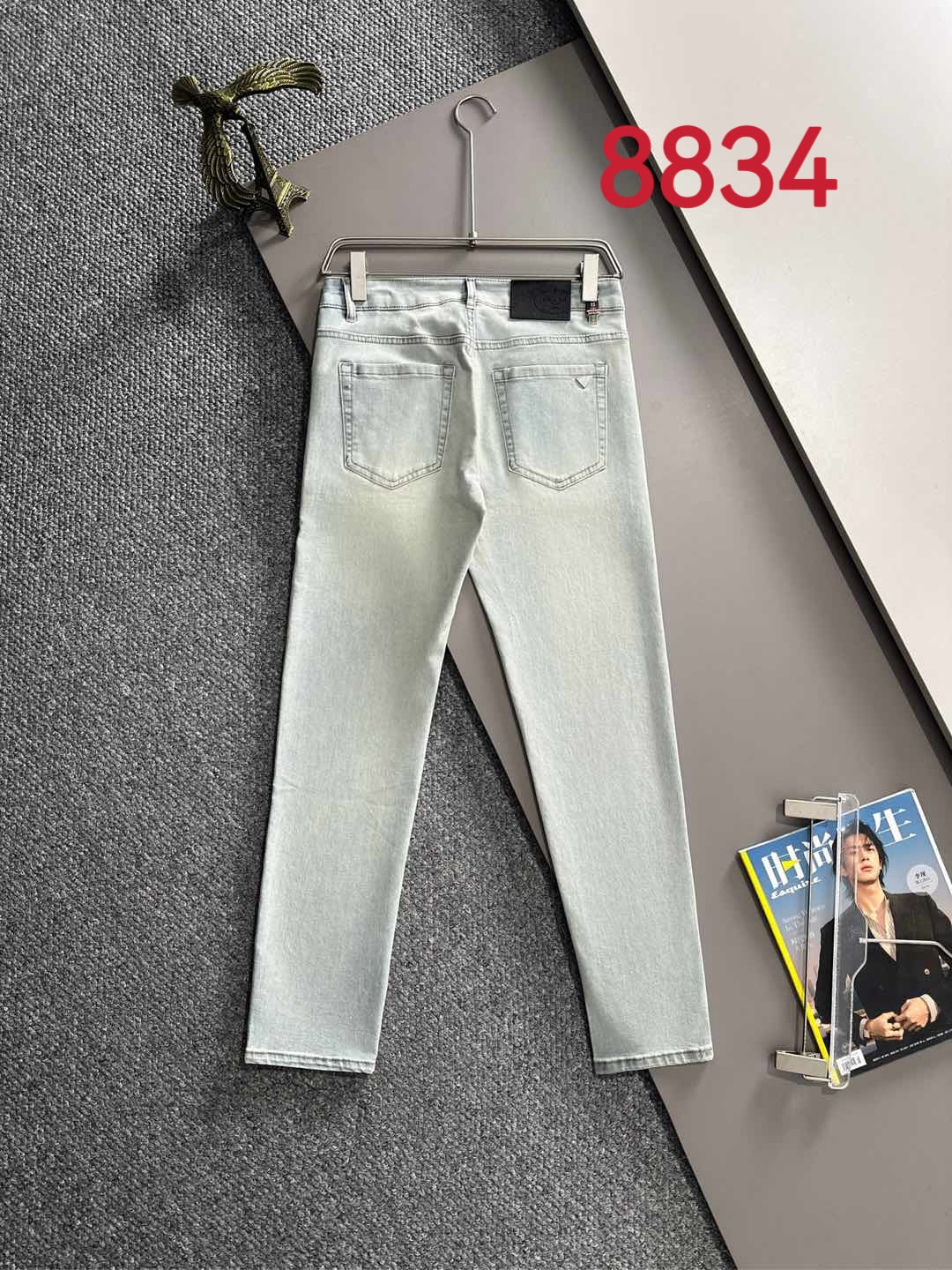 Prada light-wash denim pants with front pockets and straight legs