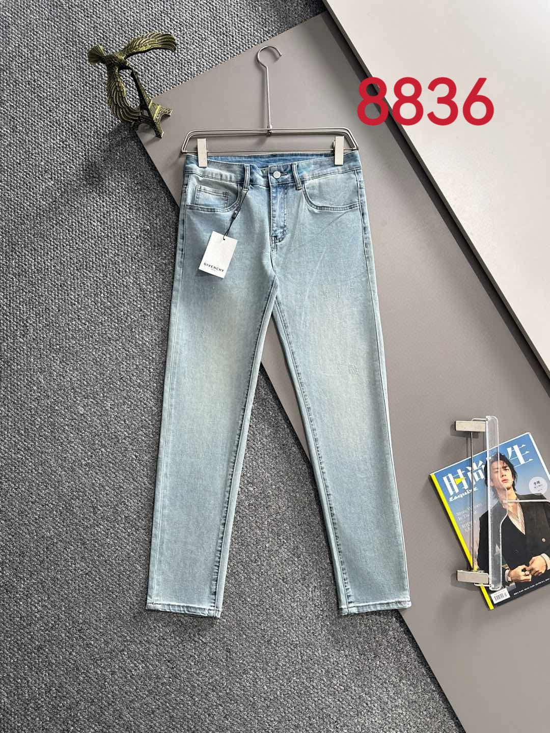 Givenchy light-wash denim jeans with hang tag and straight legs