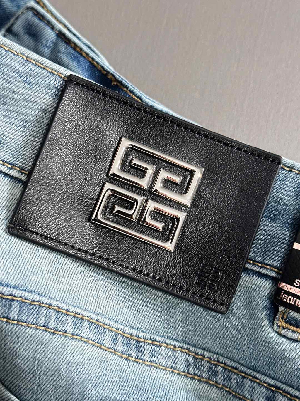 Givenchy denim jeans black logo patch with Greek-key emblem