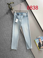Light blue denim pants with belt loops, zipper fly, and size tag