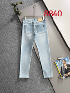 Louis Vuitton light blue denim jeans with front pockets and belt loops