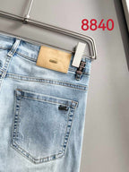 Louis Vuitton light blue denim jeans with tan back waistband patch