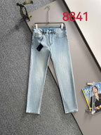 Light blue denim jeans, back view with waistband patch and straight legs.