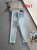 Light blue denim jeans, front view with belt loops and straight legs.
