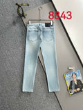 Light blue denim pants with straight legs, five-pocket design and belt loops.