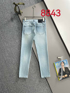 Light blue denim pants with straight legs, five-pocket design and belt loops.
