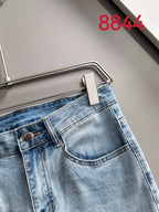 Light blue denim pants waistband with metal button and belt loops