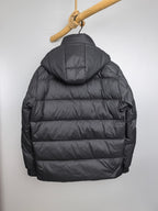 Long Moncler puffer jacket, dark gray, back view with attached hood