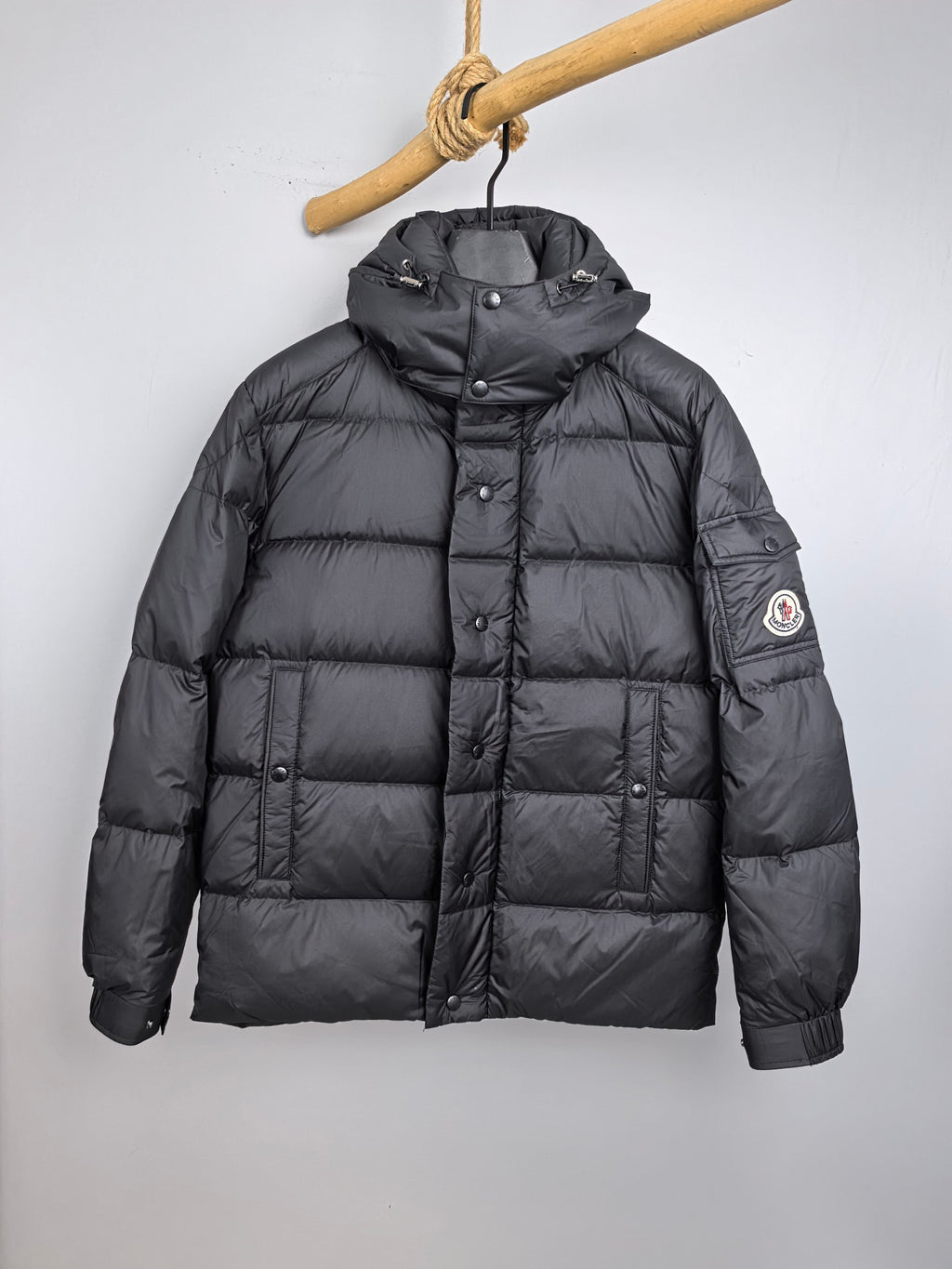 Long Moncler puffer jacket, dark gray, full-zip, hood with snap buttons