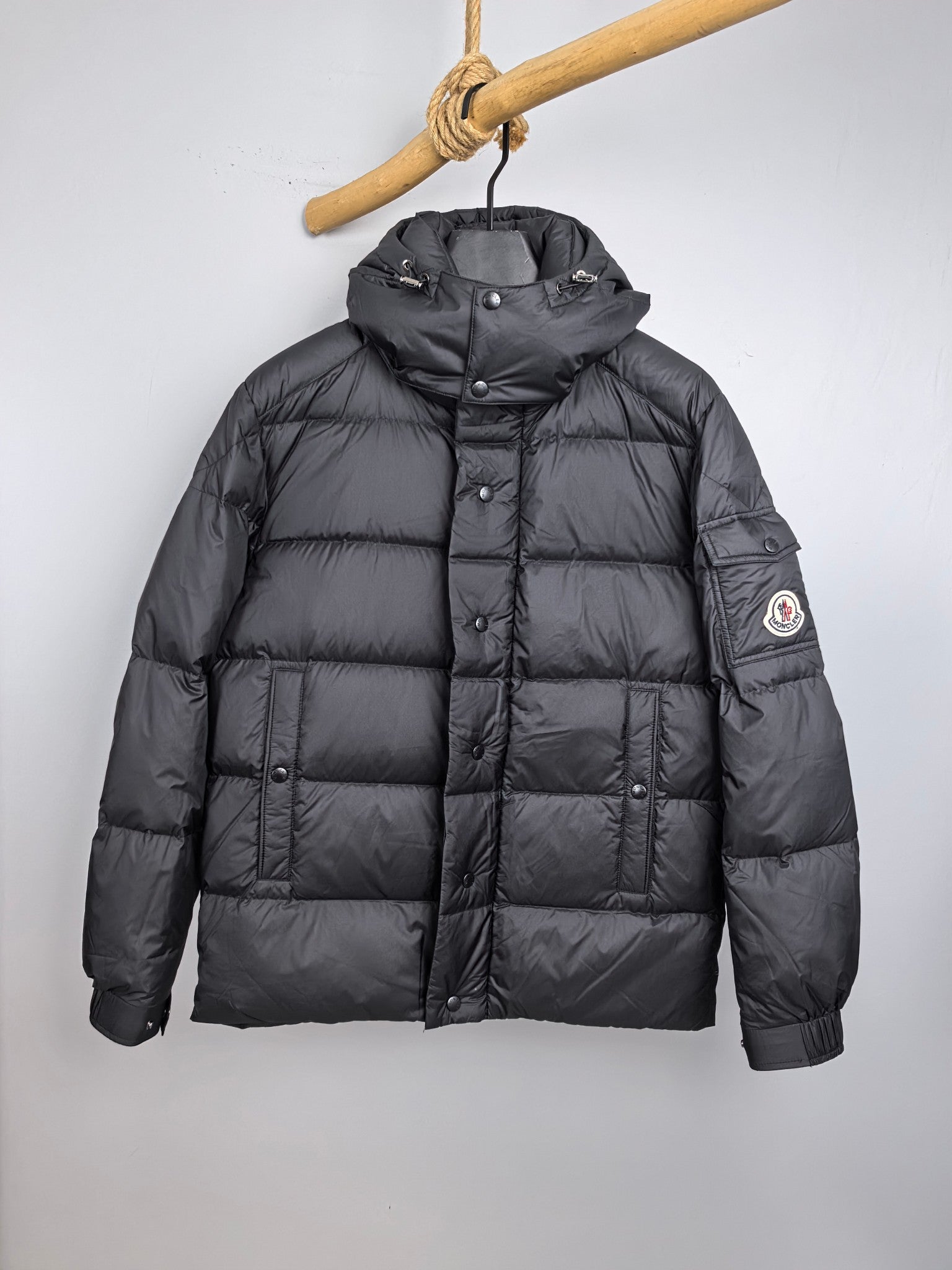 Long Moncler puffer jacket, dark gray, full-zip, hood with snap buttons
