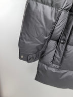 Long Moncler puffer jacket cuff with snap buttons and fabric paneling