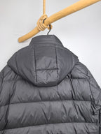 Long Moncler puffer jacket back with hood and horizontal baffles