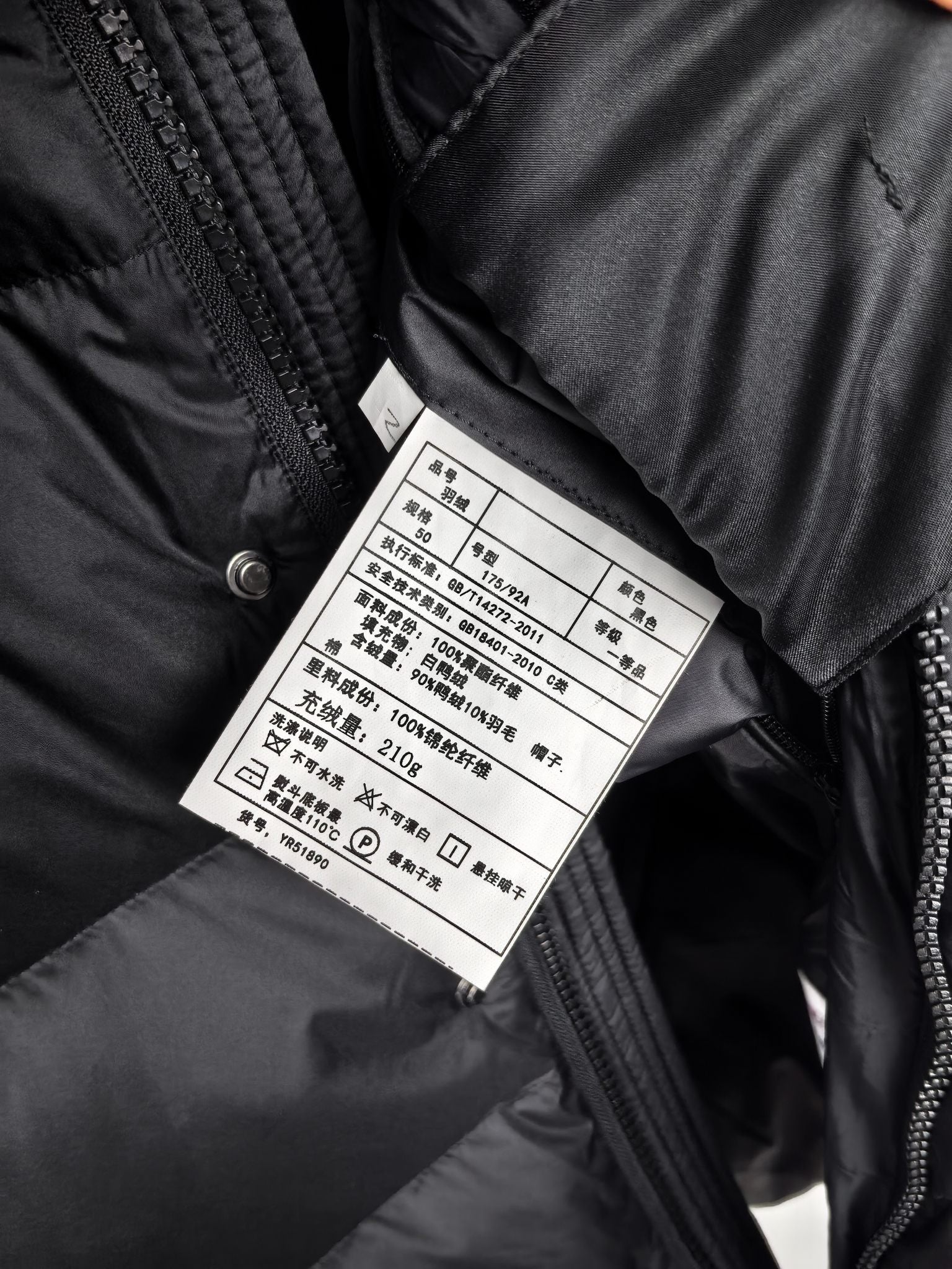 Long Moncler puffer jacket care label on inner seam