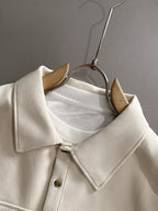 Dior long-sleeve polo shirt on hanger, light cream with button placket and collar