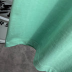 Mint green Burberry T-shirt with straight bottom hem and stitched edge