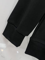 Versace black sweatshirt sleeve cuffs and ribbed hem