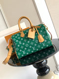 Louis Vuitton green monogram handbag with tan leather straps and side charms