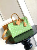 Louis Vuitton mini handbag, green monogram print with tan handles and shoulder strap