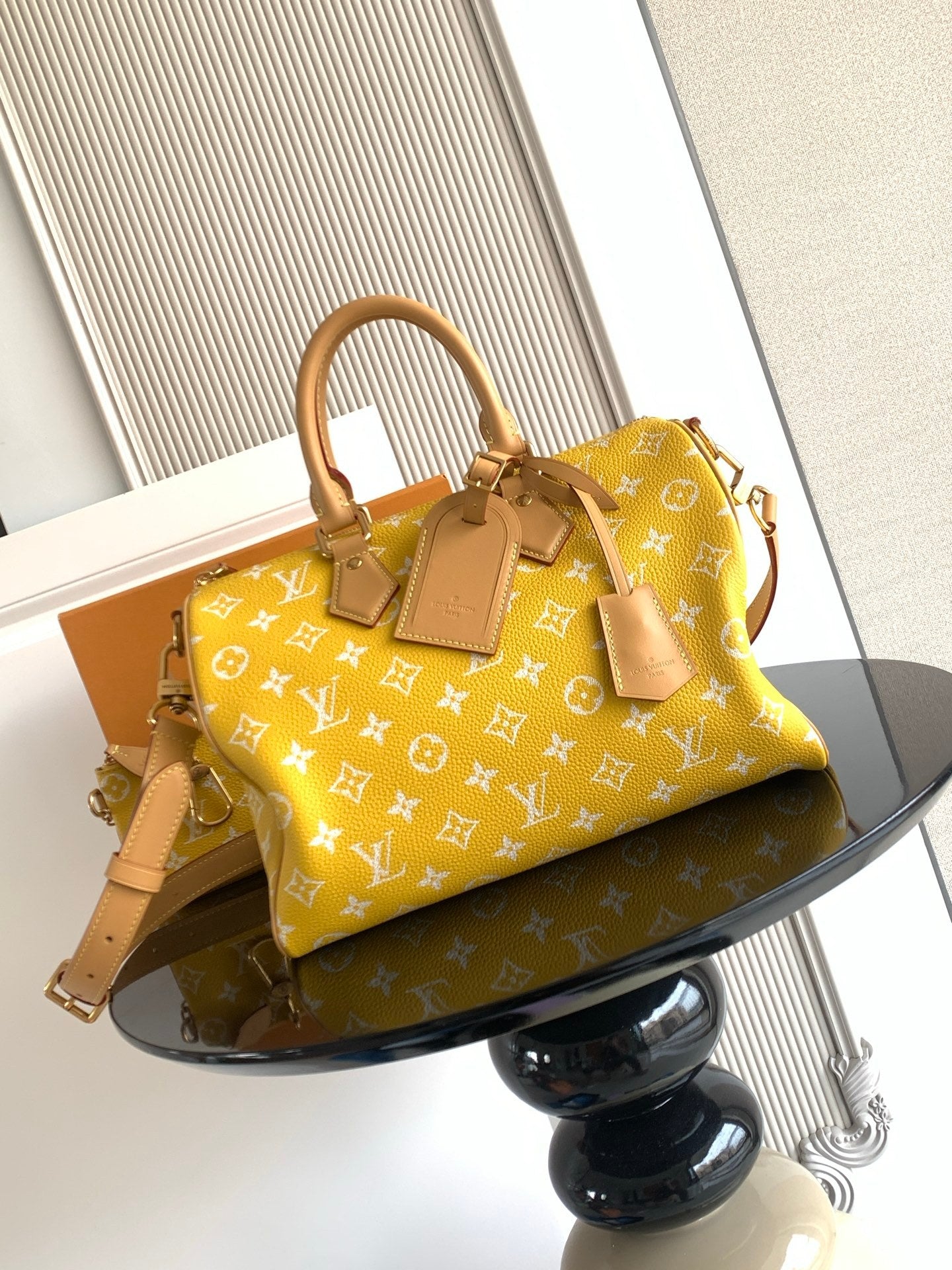 Louis Vuitton yellow monogram handbag with rolled handles, detachable strap, gold hardware