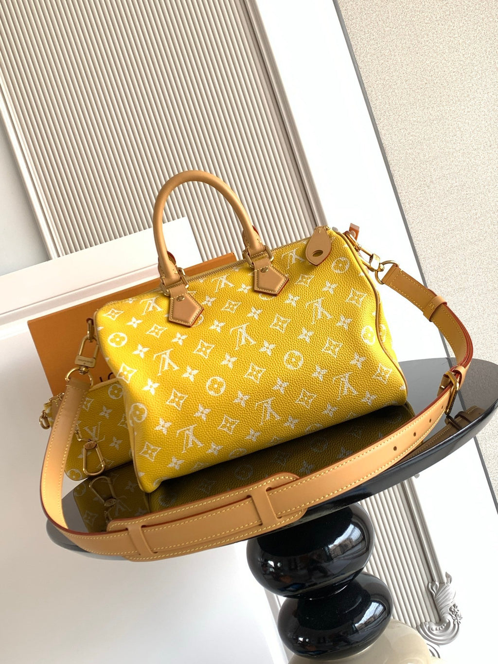 Louis Vuitton yellow monogram handbag with long shoulder strap and rectangular base