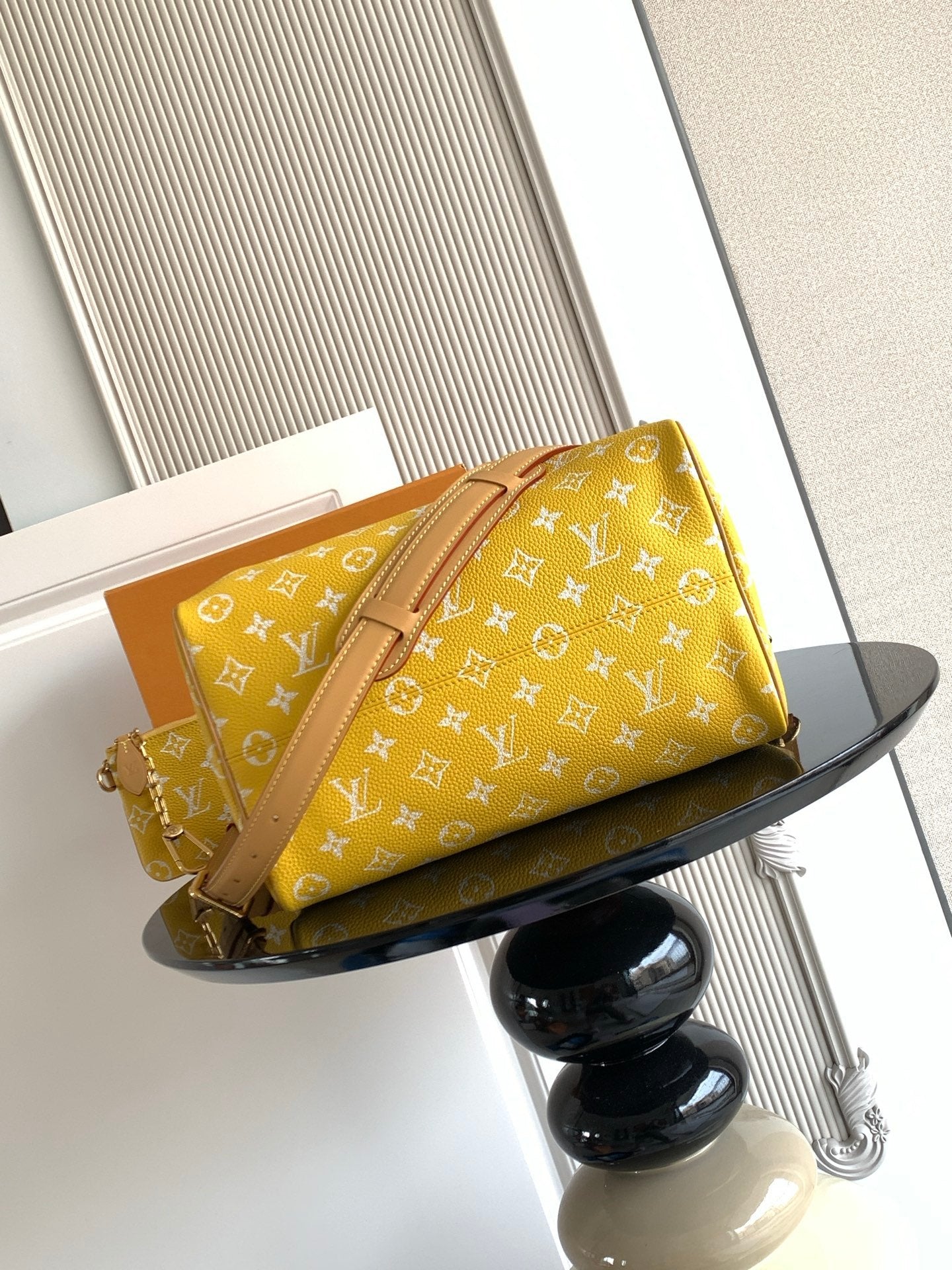 Louis Vuitton yellow monogram handbag with tan shoulder strap and top handles