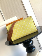 Louis Vuitton bag yellow monogram with brown leather flap, corner trim, and strap