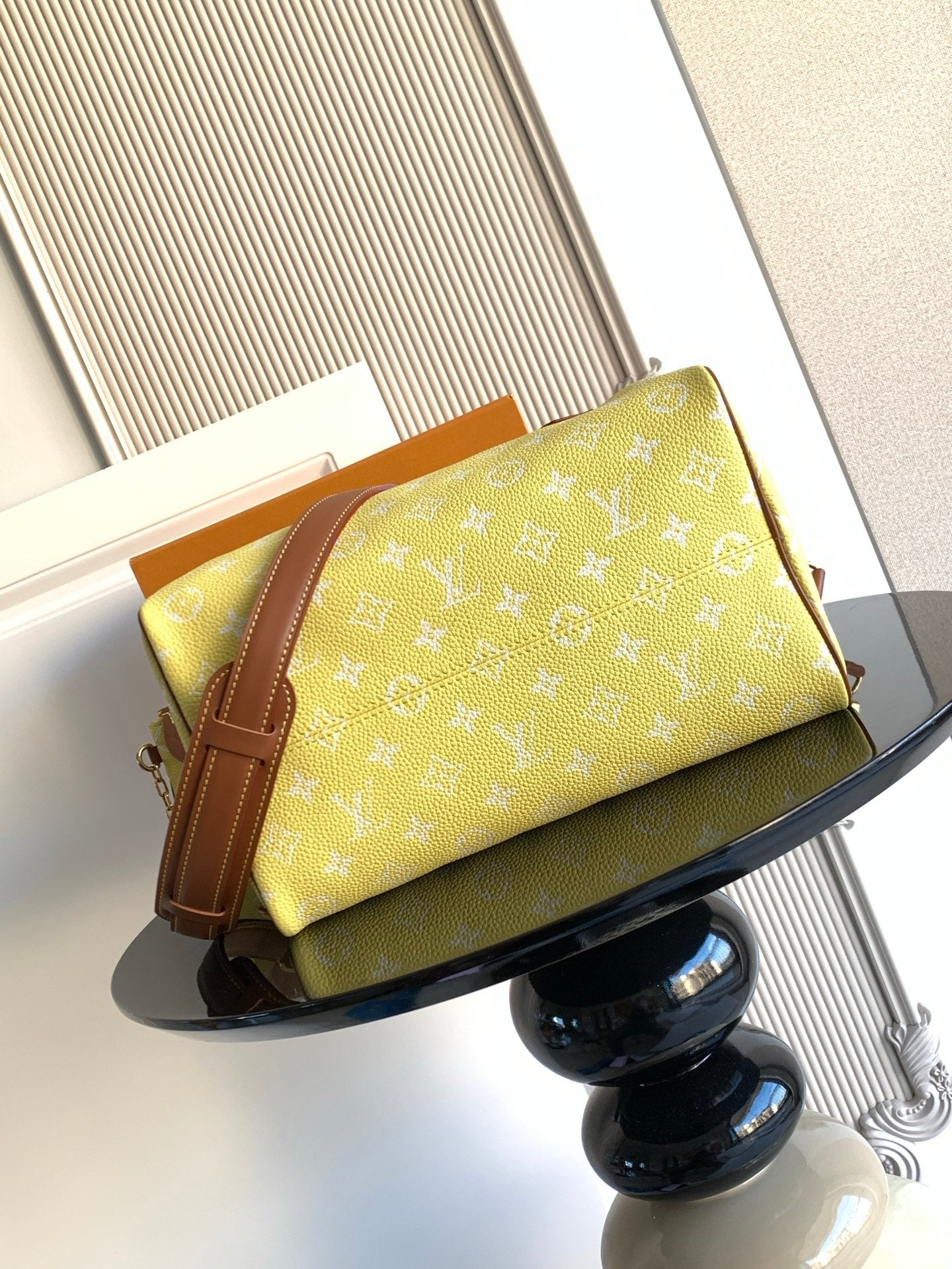 Louis Vuitton bag yellow monogram with brown leather flap, corner trim, and strap
