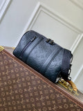Louis Vuitton men’s crossbody bag in dark blue monogram leather with gold zipper pulls