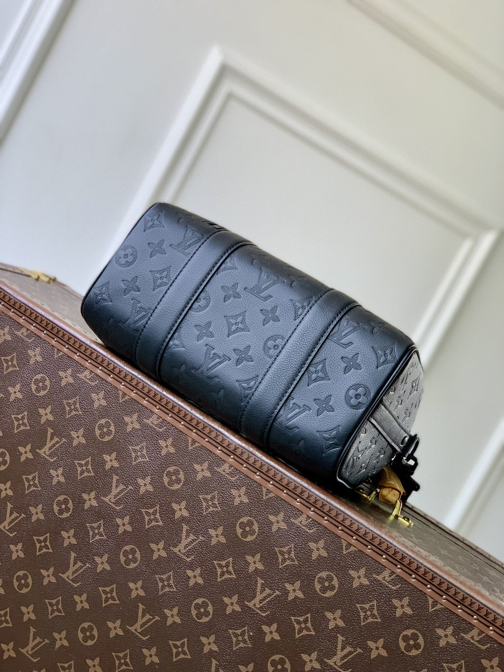 Louis Vuitton men’s crossbody bag, dark blue monogram leather with top strap detail