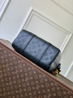 Louis Vuitton men’s crossbody bag, dark blue monogram leather with top strap detail