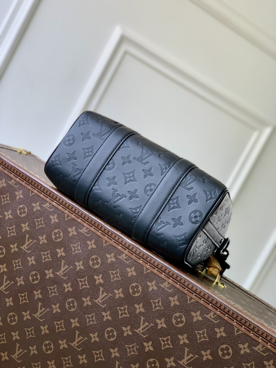 Louis Vuitton men’s crossbody bag, dark blue monogram leather with top strap detail
