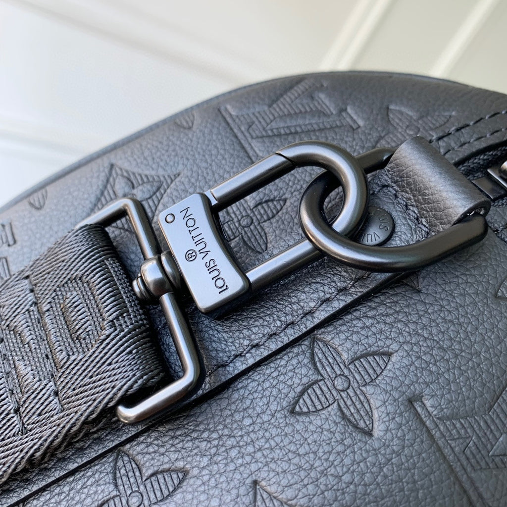 Louis Vuitton bag strap buckle with dark blue monogram embossed leather