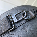 Louis Vuitton bag strap buckle with dark blue monogram embossed leather