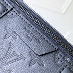 Louis Vuitton zipper edge and embossed logo on dark blue monogram leather
