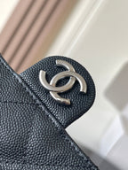 Chanel quilted bag snap hook detail with dark leather texture