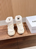 Moncler shearling ankle boots in cream with lace-up front